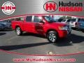 2010 Red Alert Nissan Titan SE Crew Cab 4x4  photo #1