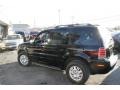 Black - Mariner Luxury 4WD Photo No. 11