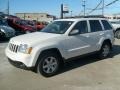 2010 Stone White Jeep Grand Cherokee Laredo 4x4  photo #1