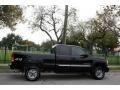 2004 Onyx Black GMC Sierra 2500HD SLE Extended Cab 4x4  photo #10