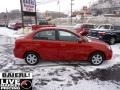 Tropical Red - Rio LX Sedan Photo No. 8