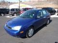 2006 Sonic Blue Metallic Ford Focus ZX4 SE Sedan  photo #5