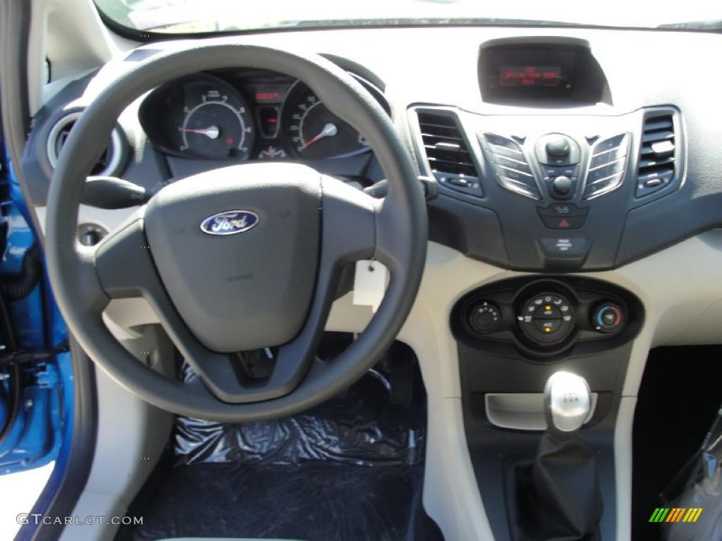 2011 Ford Fiesta S Sedan Light Stone/Charcoal Black Cloth Dashboard Photo #45258183