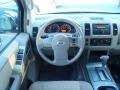 2011 Nissan Armada Almond Interior Dashboard Photo