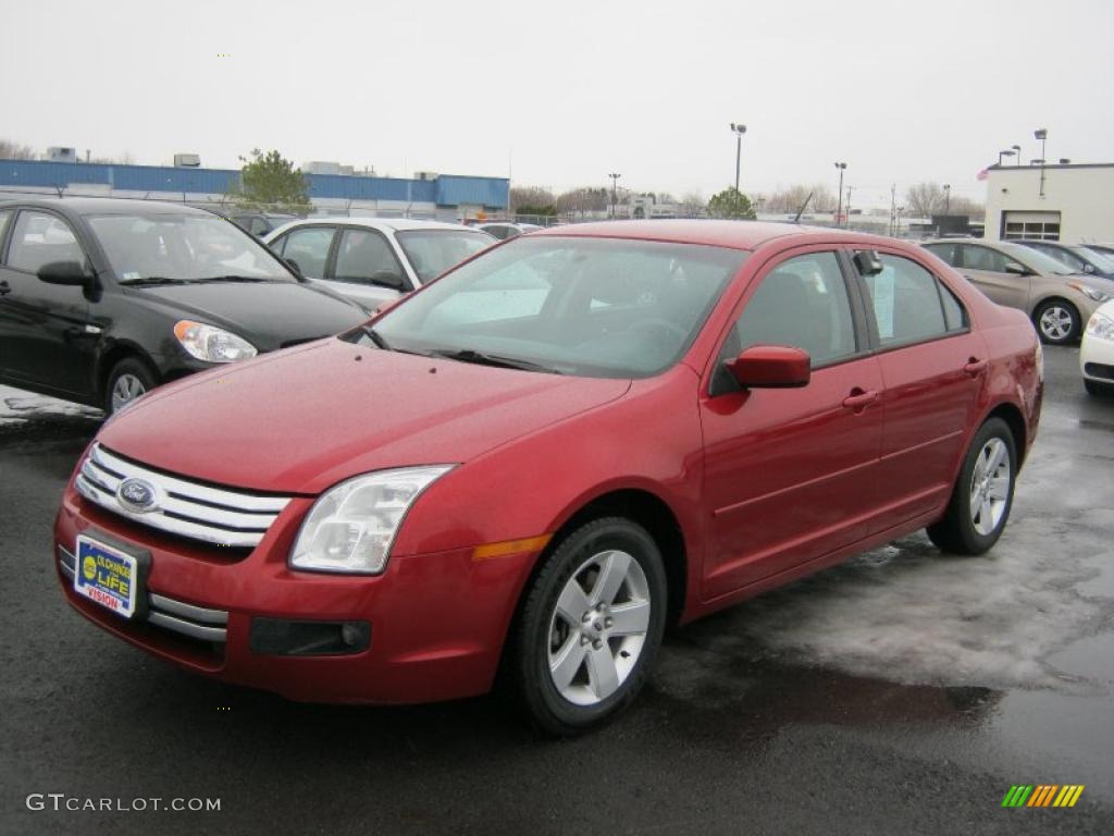 2008 Fusion SE V6 - Redfire Metallic / Medium Light Stone photo #1