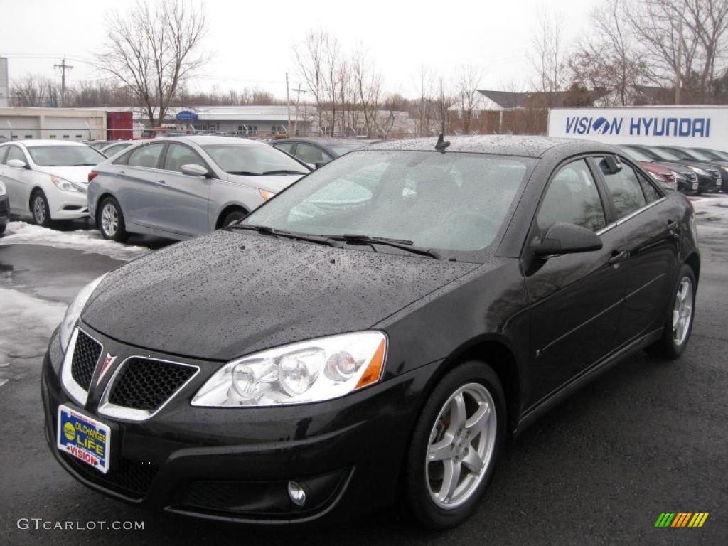 2009 G6 V6 Sedan - Carbon Black Metallic / Ebony photo #1