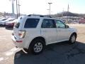White Suede - Mariner I4 4WD Photo No. 4