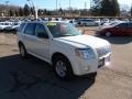 White Suede - Mariner I4 4WD Photo No. 6