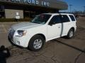 White Suede - Mariner I4 4WD Photo No. 8