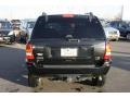2004 Brillant Black Crystal Pearl Jeep Grand Cherokee Overland 4x4  photo #3