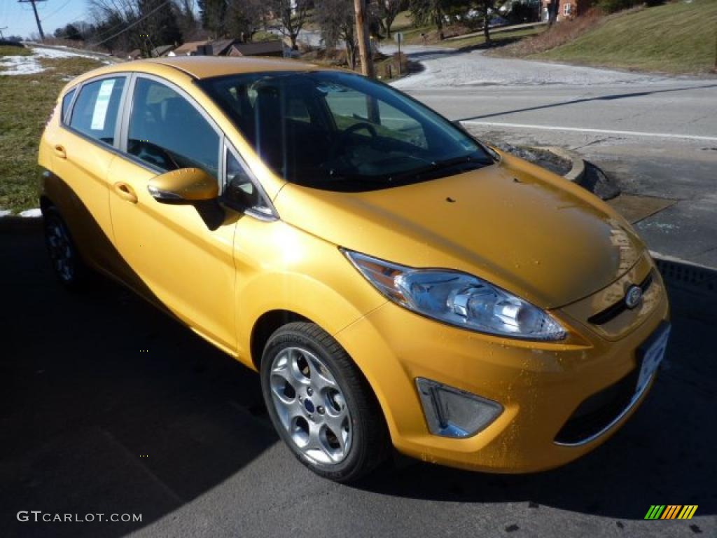 2011 Fiesta SES Hatchback - Yellow Blaze Metallic Tri-Coat / Charcoal Black/Blue Cloth photo #1