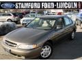 Autumn Copper Pearl Metallic 1998 Nissan Altima GXE