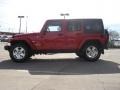 2011 Flame Red Jeep Wrangler Unlimited Sahara 4x4  photo #6