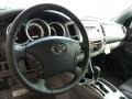 Graphite Gray 2011 Toyota Tacoma V6 TRD Sport Access Cab 4x4 Steering Wheel