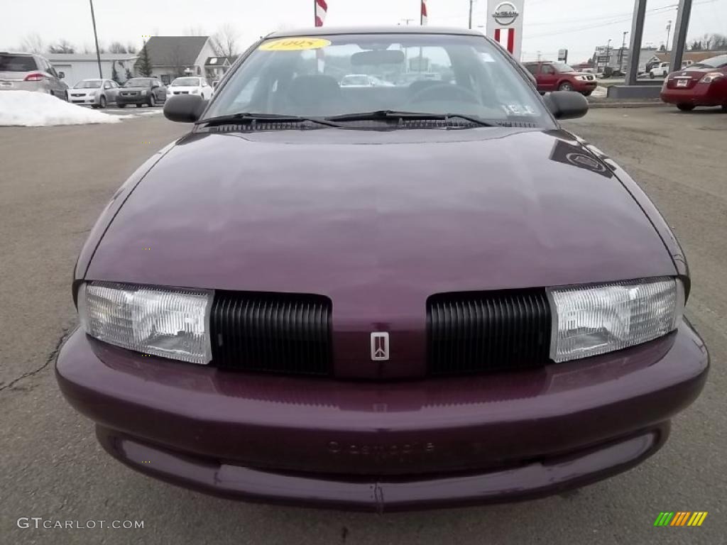 Dark Cherry Metallic 1995 Oldsmobile Achieva S Coupe Exterior Photo #45445731