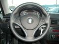 Black 2011 BMW 3 Series 328i xDrive Coupe Steering Wheel