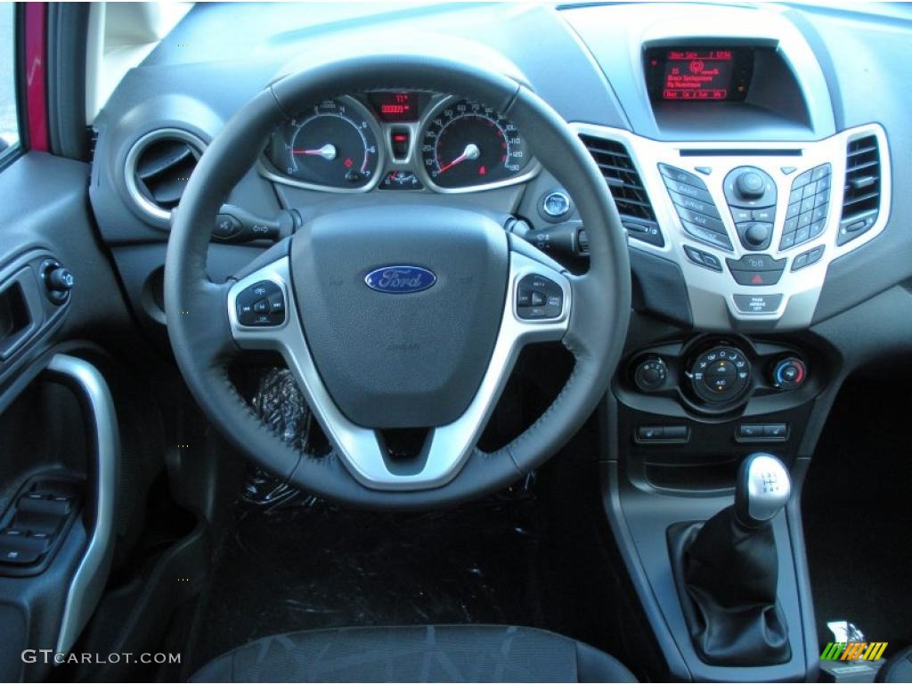 2011 Fiesta SES Hatchback - Bright Magenta Metallic / Charcoal Black/Blue Cloth photo #7