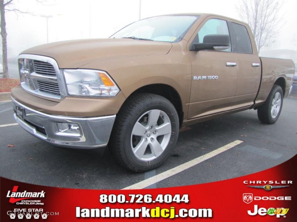 2011 Ram 1500 Big Horn Quad Cab - Saddle Brown Pearl / Light Pebble Beige/Bark Brown photo #1