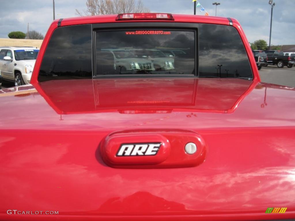 2010 Titan LE Crew Cab - Red Alert / Almond photo #17