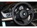 Ivory White 2011 BMW Z4 sDrive35is Roadster Steering Wheel