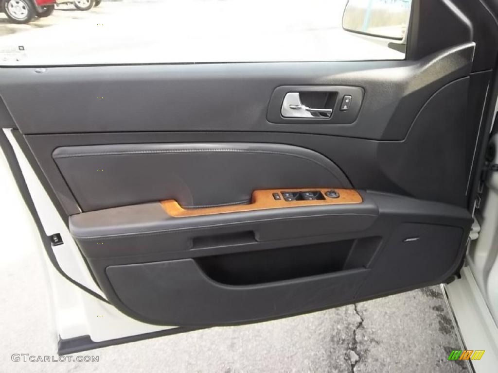 2010 Cadillac STS V8 Ebony Door Panel Photo #45526172