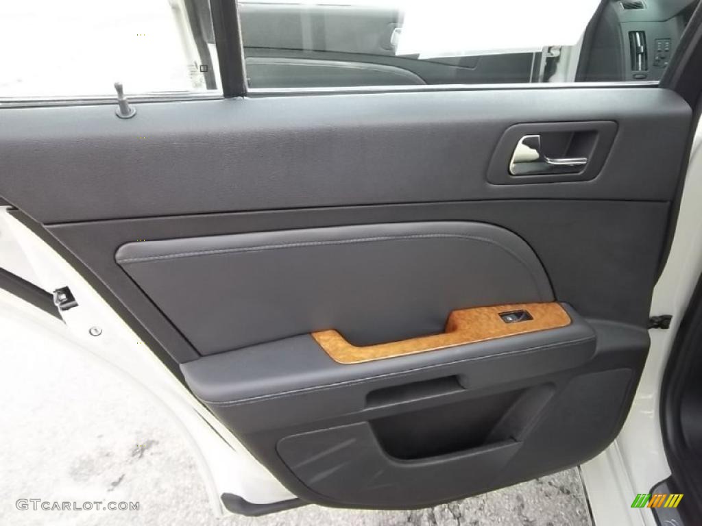 2010 Cadillac STS V8 Ebony Door Panel Photo #45526392