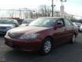 2006 Salsa Red Pearl Toyota Camry LE  photo #3