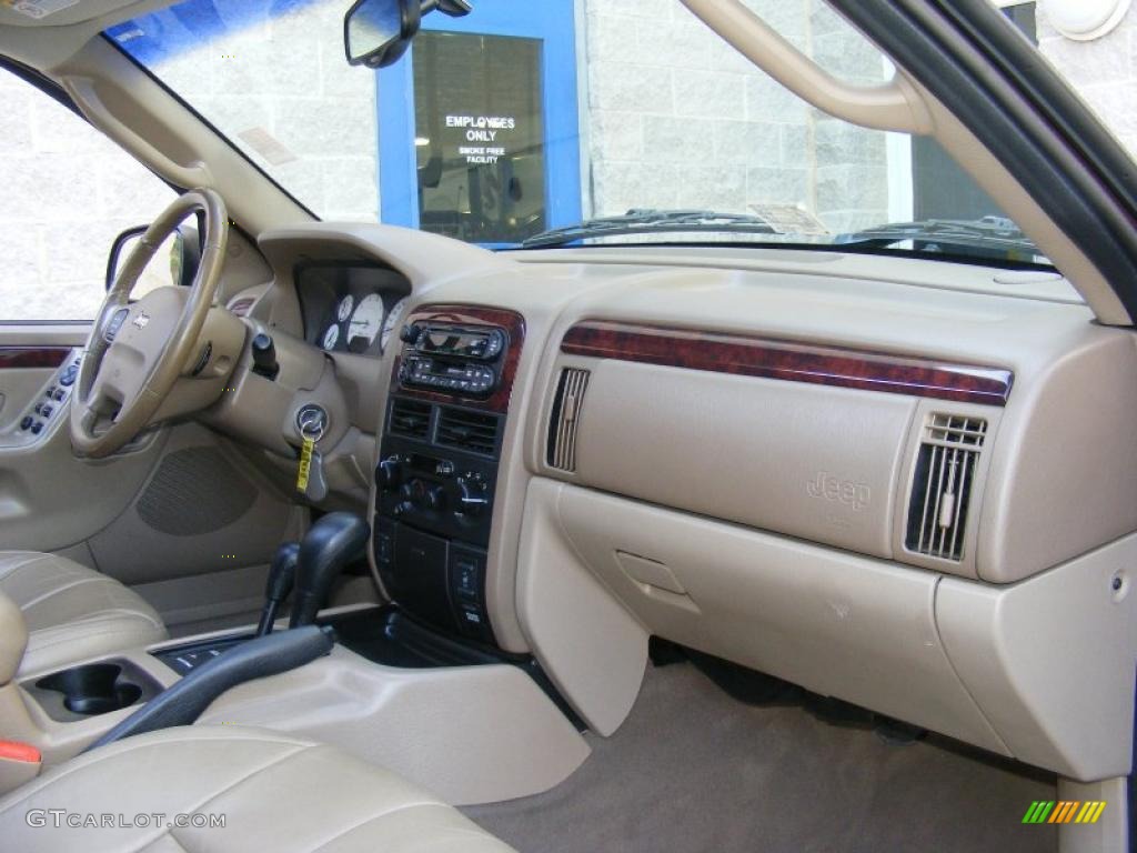 2002 Grand Cherokee Limited 4x4 - Dark Garnet Red Pearlcoat / Sandstone photo #28