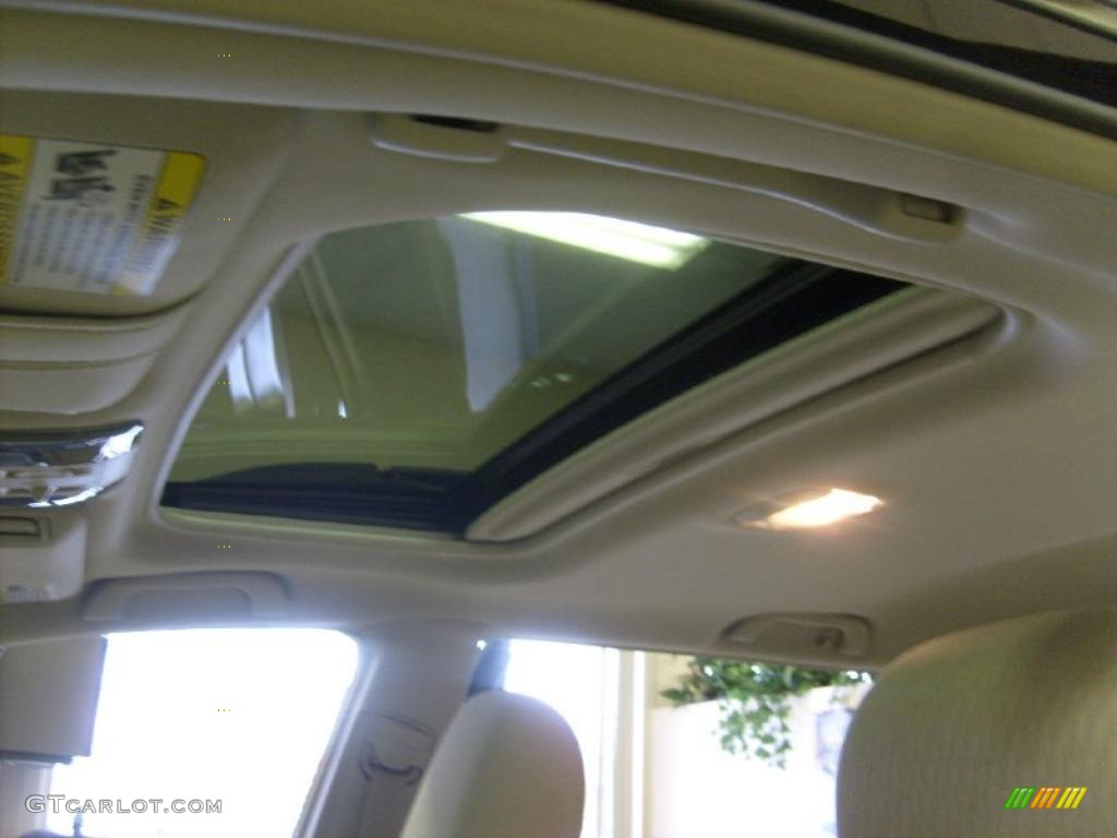 2011 Outback 2.5i Premium Wagon - Crystal Black Silica / Warm Ivory photo #4