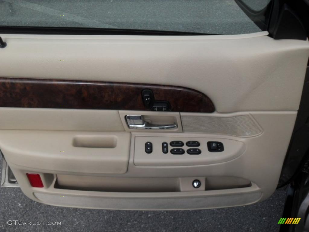 2006 Mercury Grand Marquis LS Medium Light Stone Door Panel Photo #45619628