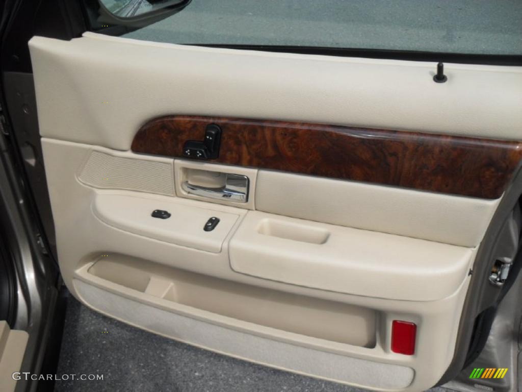 2006 Mercury Grand Marquis LS Medium Light Stone Door Panel Photo #45619688