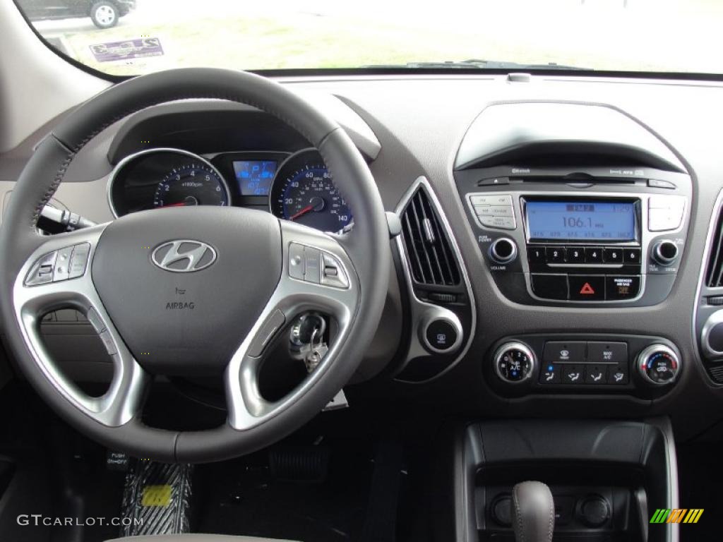 2011 Hyundai Tucson GLS Taupe Dashboard Photo #45650583