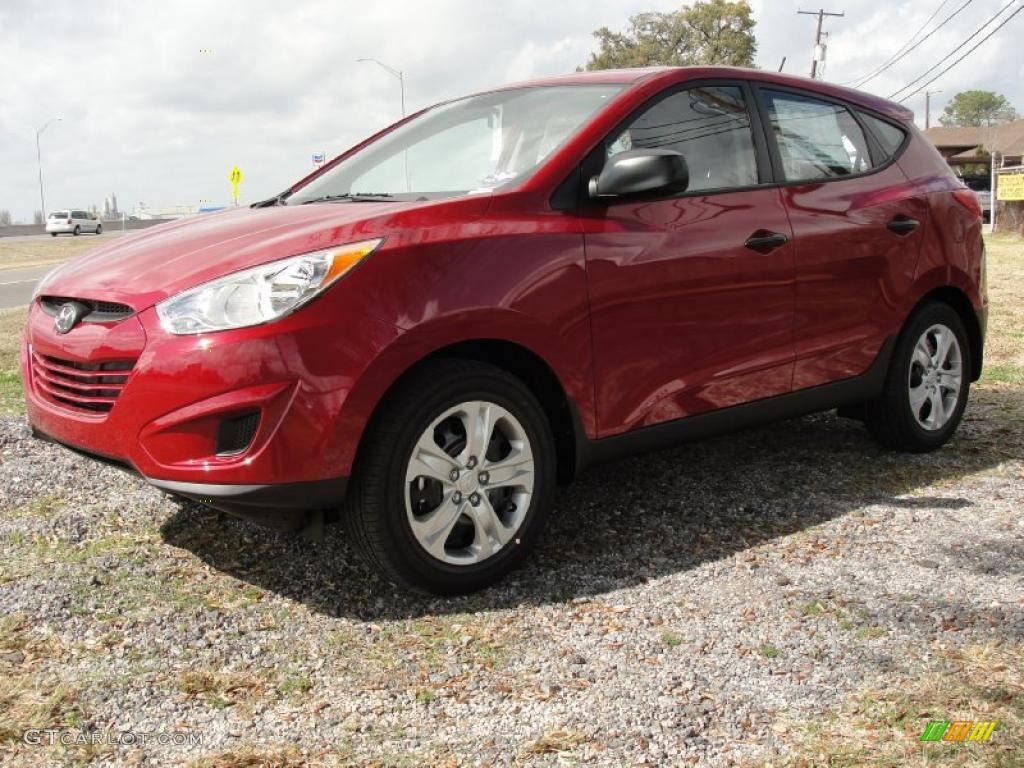 Garnet Red 2011 Hyundai Tucson GL Exterior Photo #45650789