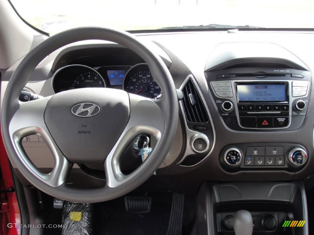2011 Hyundai Tucson GL Taupe Dashboard Photo #45651061