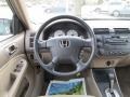 Beige 2002 Honda Civic LX Sedan Dashboard