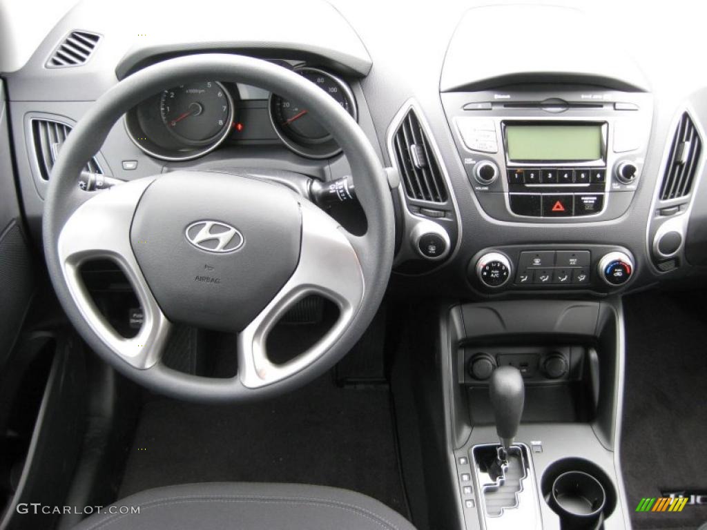 2011 Hyundai Tucson GL Black Dashboard Photo #45696729
