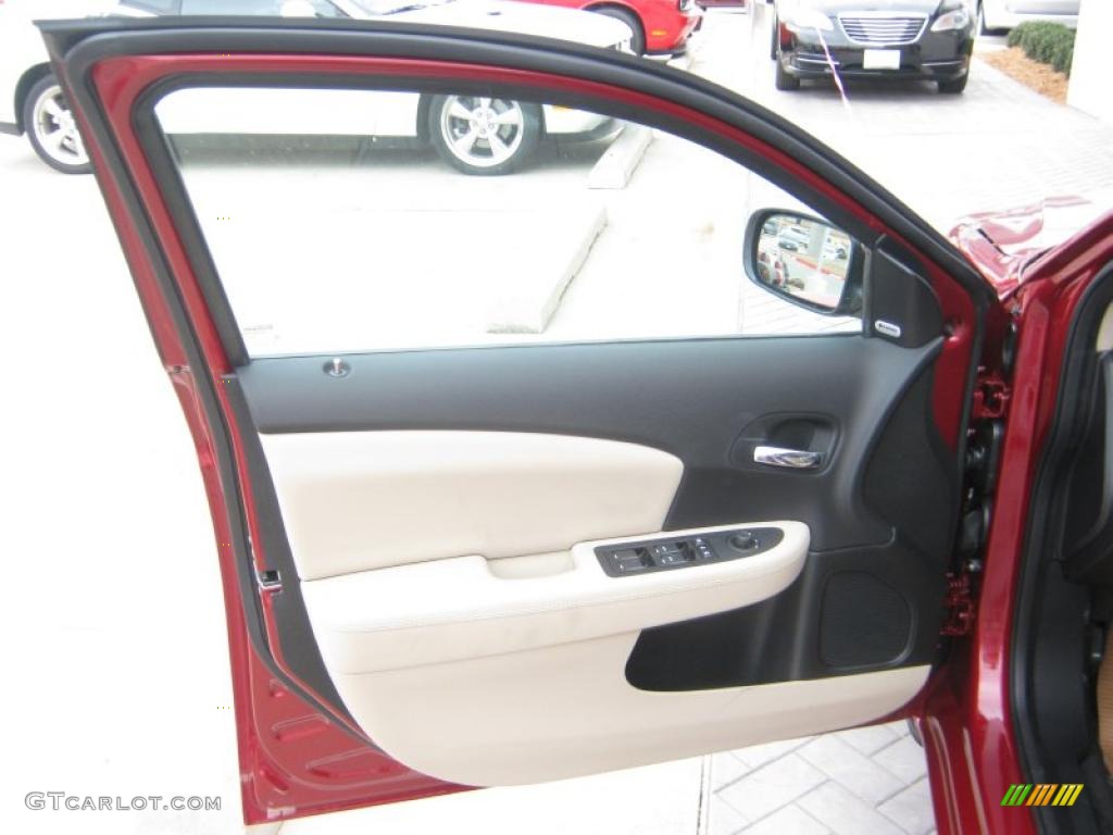 2011 Chrysler 200 Limited Black/Light Frost Beige Door Panel Photo #45704394