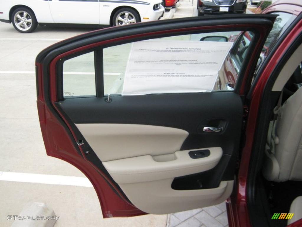 2011 Chrysler 200 Limited Black/Light Frost Beige Door Panel Photo #45704402