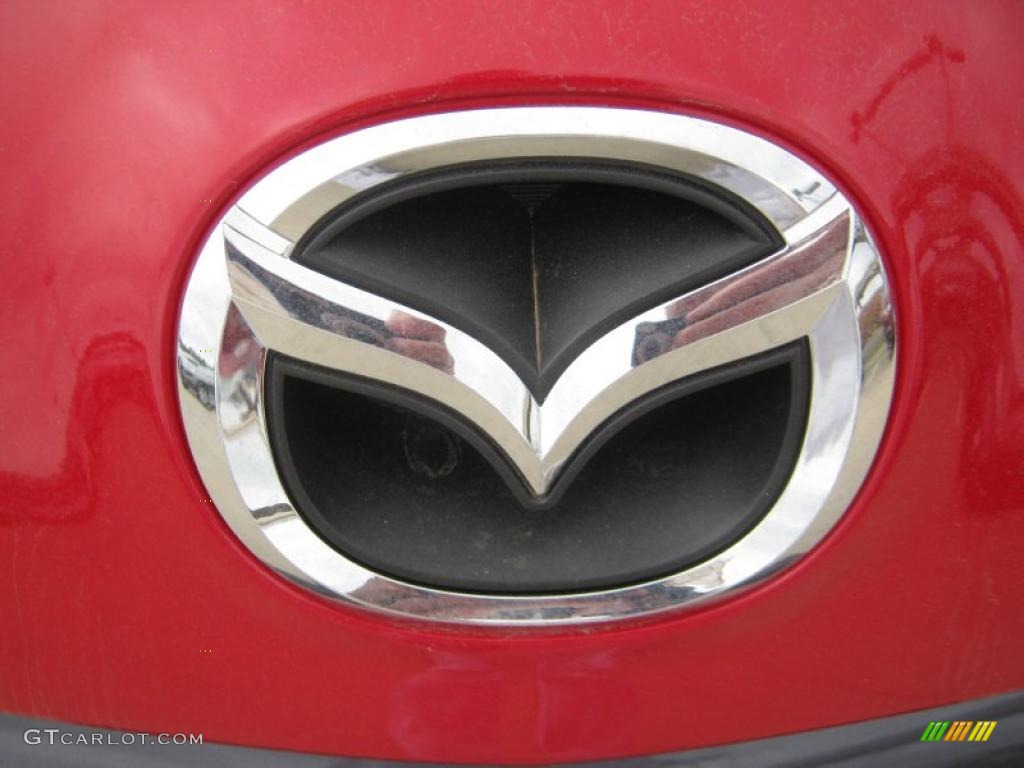 2011 Mazda MAZDA3 s Sport 4 Door Marks and Logos Photos