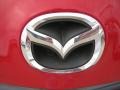 2011 Mazda MAZDA3 s Sport 4 Door Badge and Logo Photo