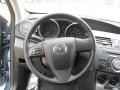 Black 2011 Mazda MAZDA3 i Sport 4 Door Steering Wheel