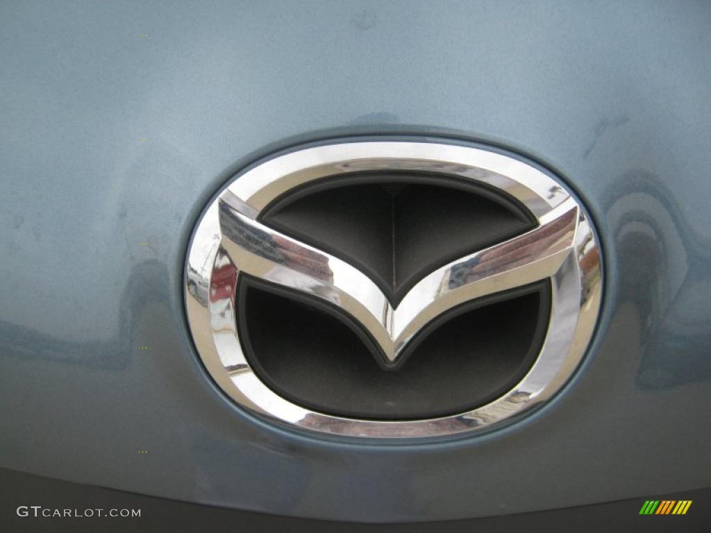 2011 Mazda MAZDA3 i Sport 4 Door Marks and Logos Photo #45706782