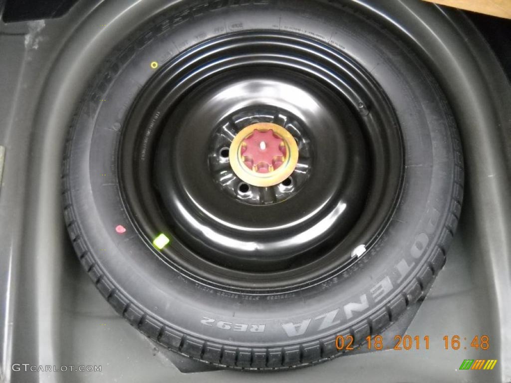 2003 Solara SLE V6 Coupe - Black Sand Pearl / Ivory photo #12