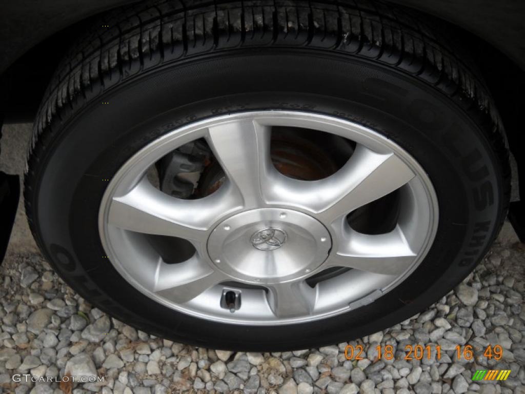 2003 Solara SLE V6 Coupe - Black Sand Pearl / Ivory photo #15