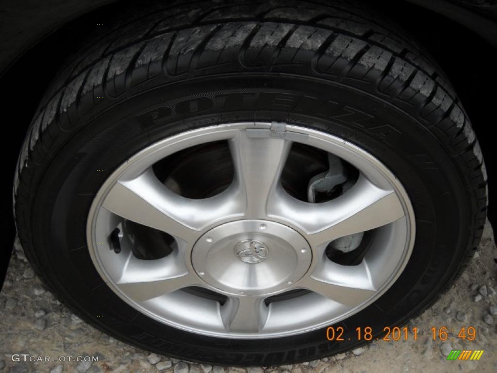 2003 Solara SLE V6 Coupe - Black Sand Pearl / Ivory photo #16