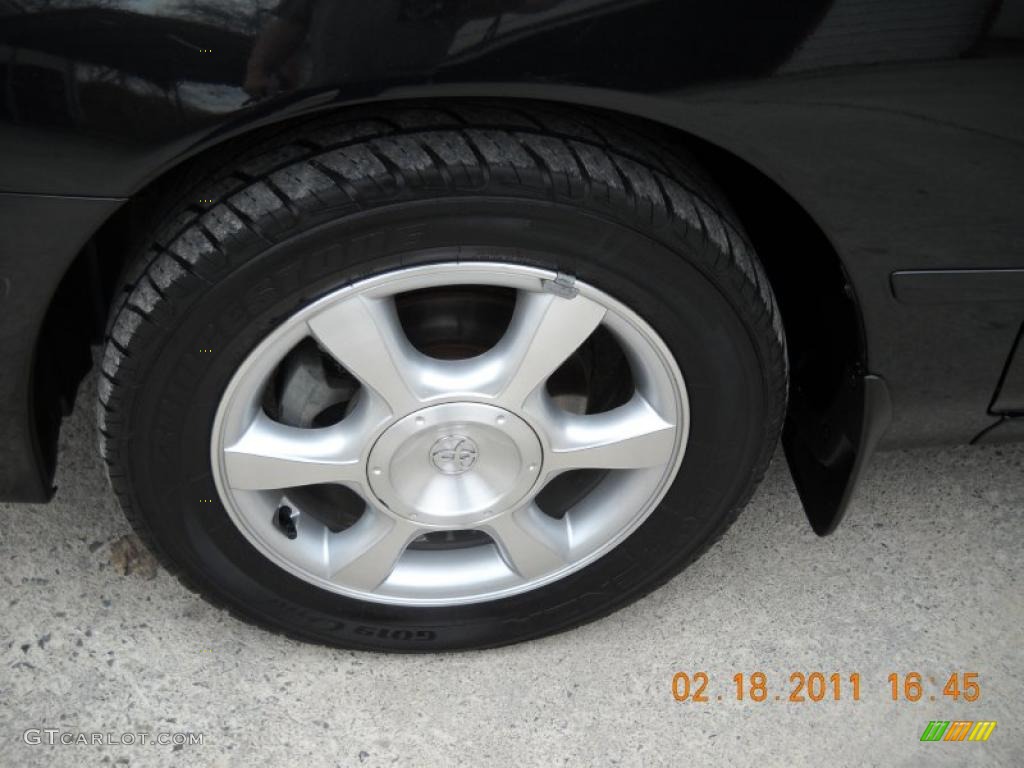 2003 Solara SLE V6 Coupe - Black Sand Pearl / Ivory photo #17