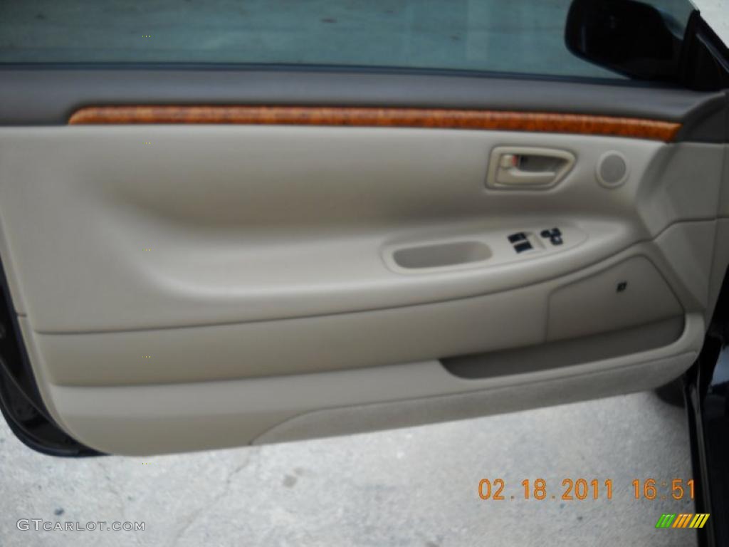 2003 Solara SLE V6 Coupe - Black Sand Pearl / Ivory photo #19