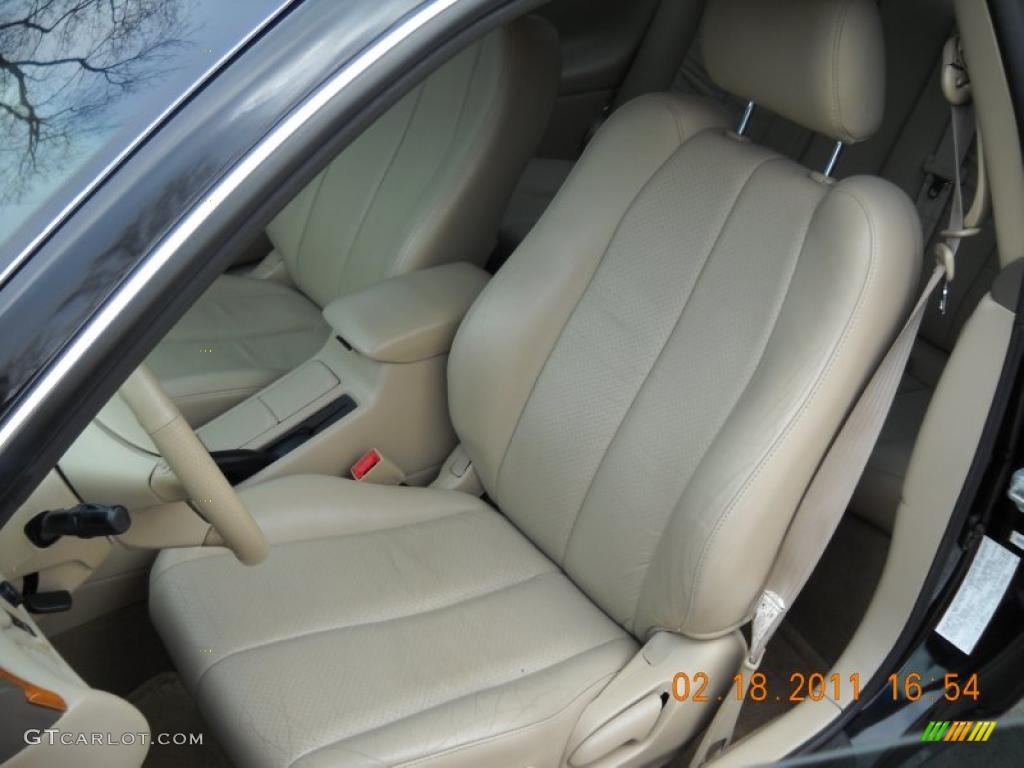 2003 Solara SLE V6 Coupe - Black Sand Pearl / Ivory photo #23