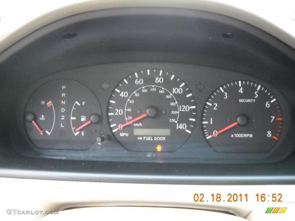 2003 Solara SLE V6 Coupe - Black Sand Pearl / Ivory photo #25