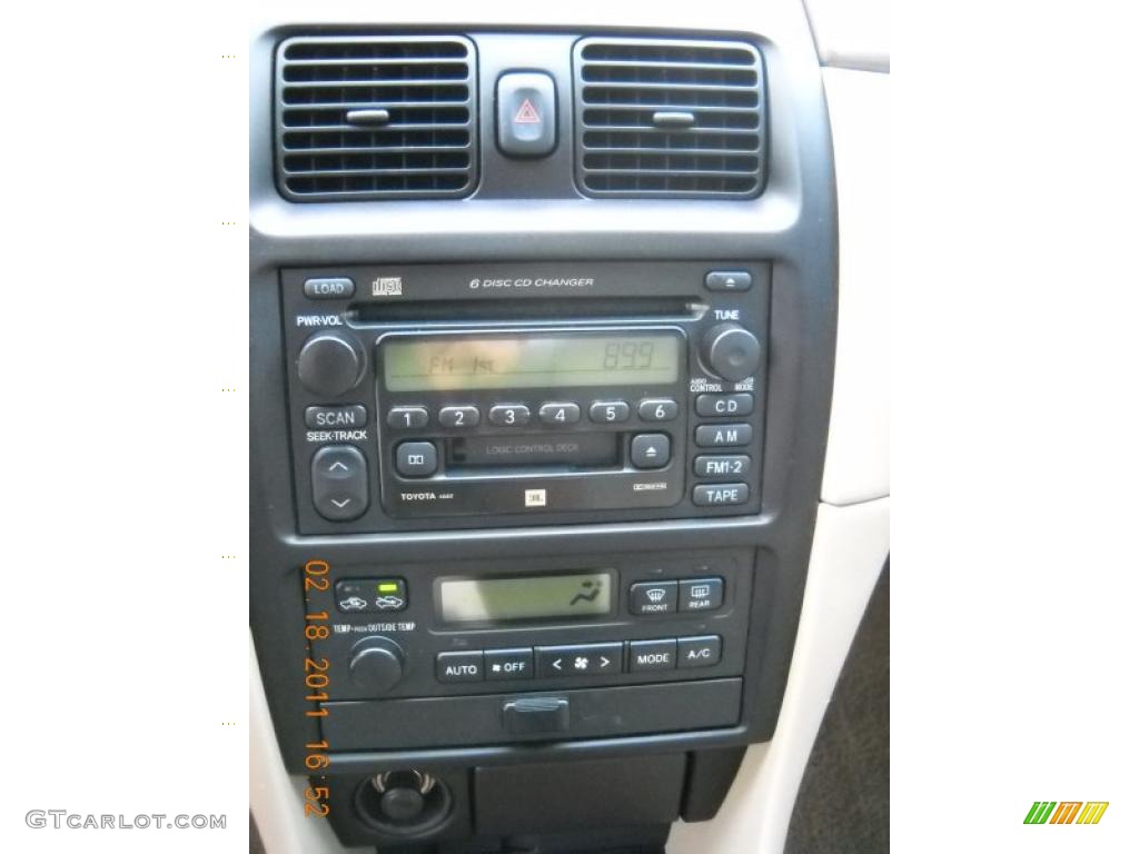 2003 Solara SLE V6 Coupe - Black Sand Pearl / Ivory photo #28